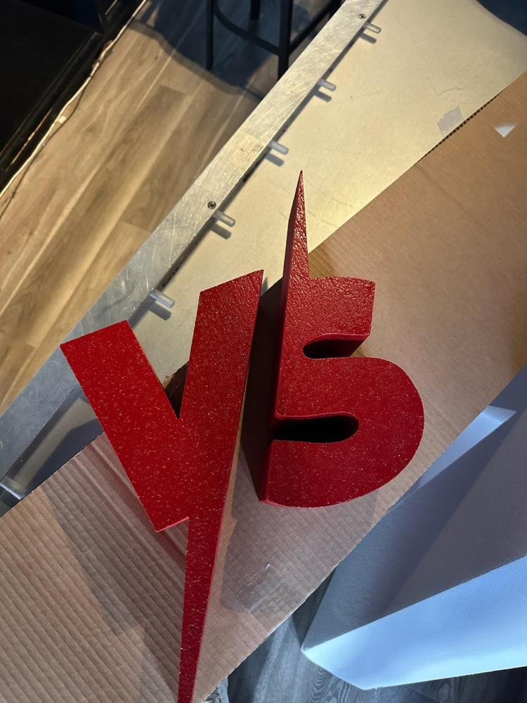 Letras VS rojas en 3D
